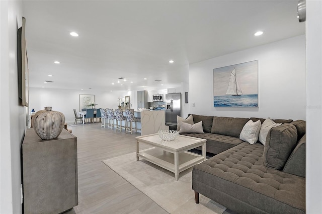 1984 Kansas Ave NE, Saint Petersburg, FL 33703 - living room with light wood-type flooring and recessed lighting