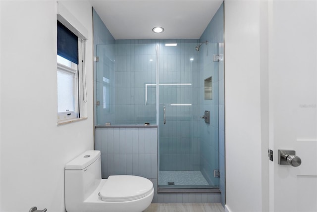 1984 Kansas Ave NE, Saint Petersburg, FL 33703 - full bathroom featuring a shower stall and toilet