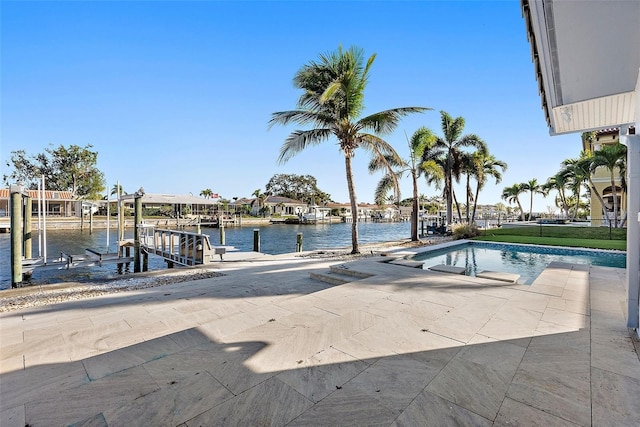 1984 Kansas Ave NE, Saint Petersburg, FL 33703 - pool featuring a dock, a water view, and boat lift