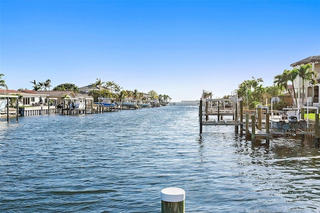 1984 Kansas Ave NE, Saint Petersburg, FL 33703 - dock area featuring a water view and boat lift
