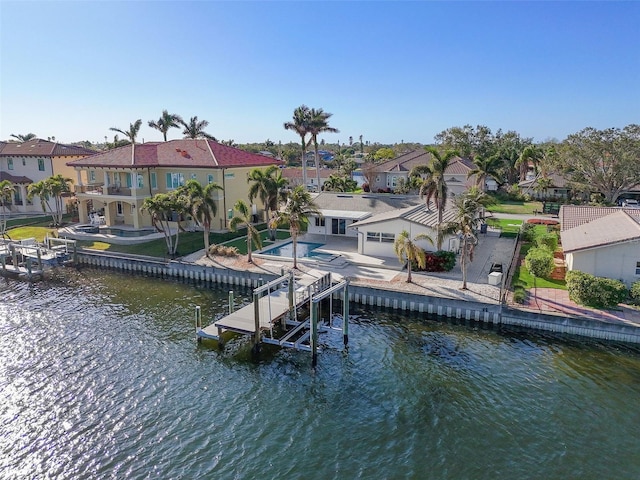 1984 Kansas Ave NE, Saint Petersburg, FL 33703 - dock area with a residential view, a water view, a patio, and boat lift