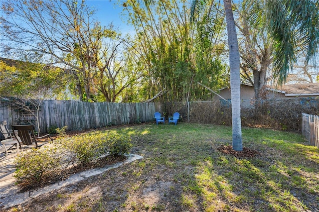 view of yard featuring a fenced backyard