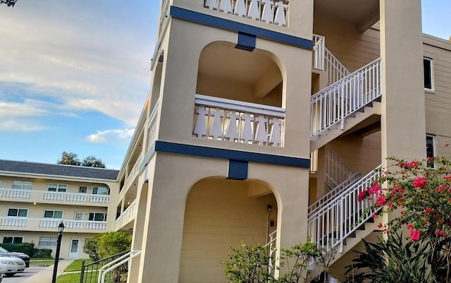 view of building exterior with stairs