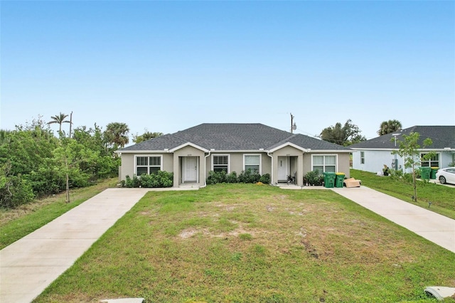 ranch-style home with a front yard and stucco siding