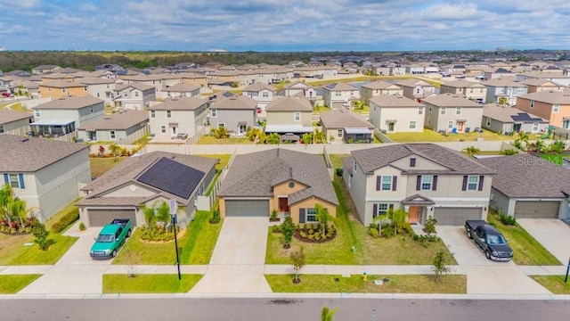 drone / aerial view with a residential view