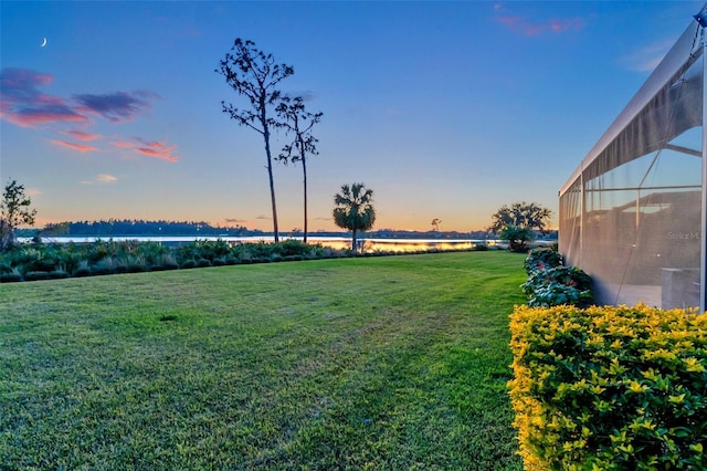 view of yard with a water view