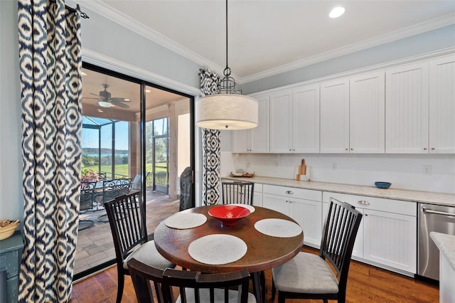 dining room featuring dark wood-style floors, ceiling fan, ornamental molding, and recessed lighting