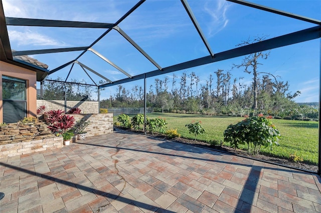 view of patio / terrace with glass enclosure