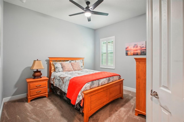 bedroom featuring ceiling fan, baseboards, and carpet floors