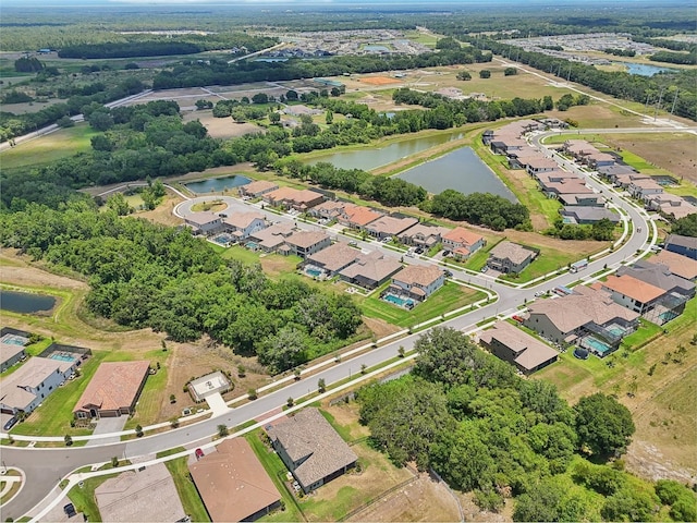 aerial view featuring a residential view and a water view