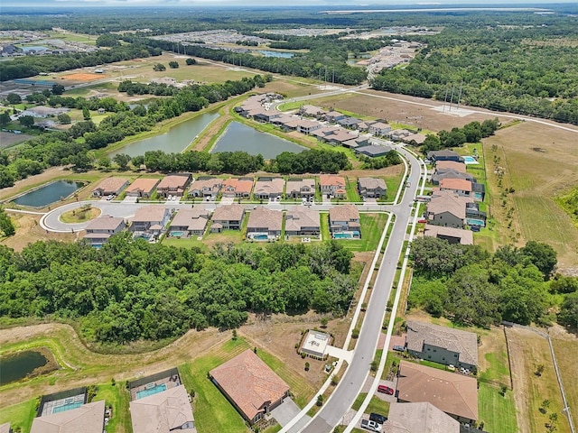 aerial view featuring a water view and a residential view