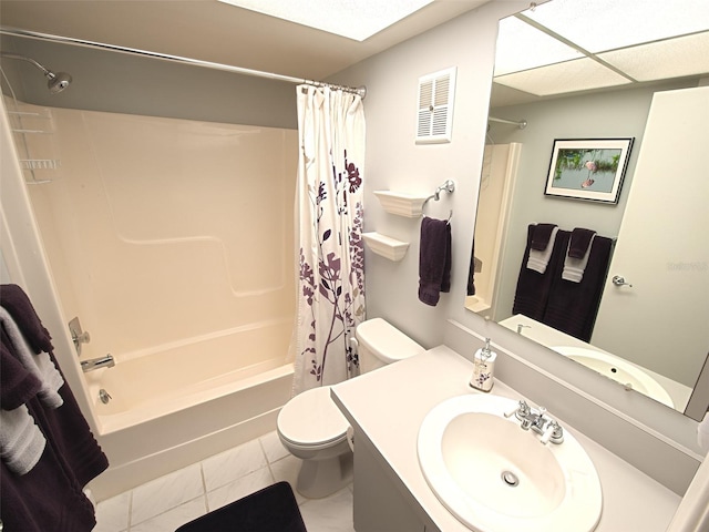 full bathroom featuring visible vents, toilet, shower / tub combo, vanity, and tile patterned flooring