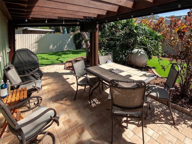 view of patio / terrace with fence and outdoor dining area