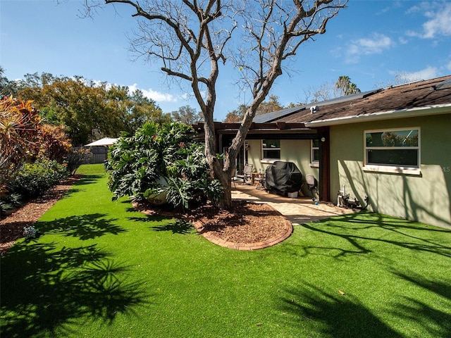 view of yard featuring a fenced backyard and a patio