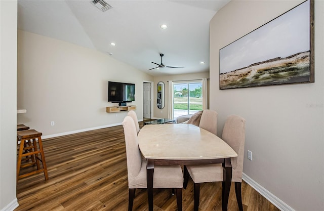 18186 Sandy Pointe Dr, Tampa, FL 33647 - dining room featuring a ceiling fan, wood finished floors, vaulted ceiling, and visible vents