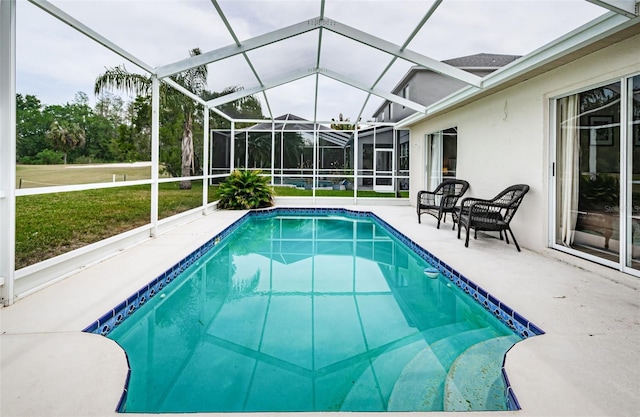 18186 Sandy Pointe Dr, Tampa, FL 33647 - outdoor pool featuring glass enclosure and a patio
