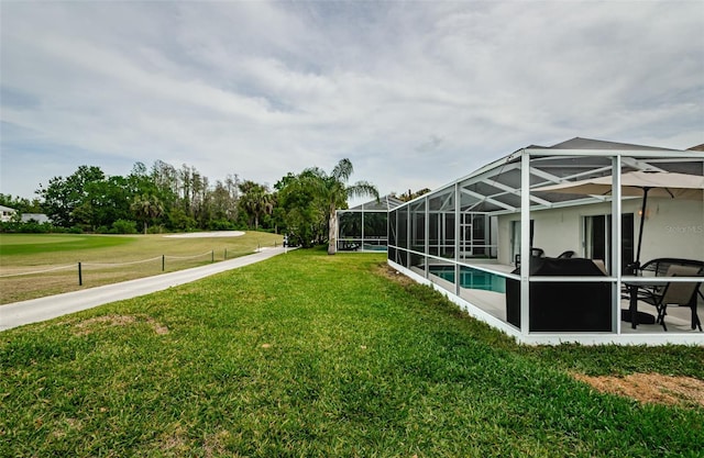 18186 Sandy Pointe Dr, Tampa, FL 33647 - view of yard with a patio, a lanai, and an outdoor pool
