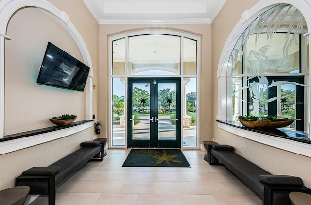 18186 Sandy Pointe Dr, Tampa, FL 33647 - entrance foyer featuring french doors, tile patterned flooring, and ornamental molding