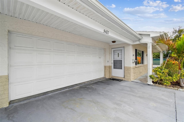 garage with driveway