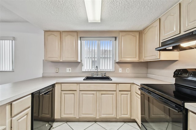 kitchen featuring a textured ceiling, under cabinet range hood, a sink, light countertops, and black appliances