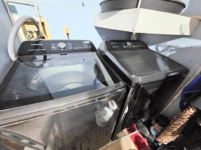 laundry area featuring independent washer and dryer