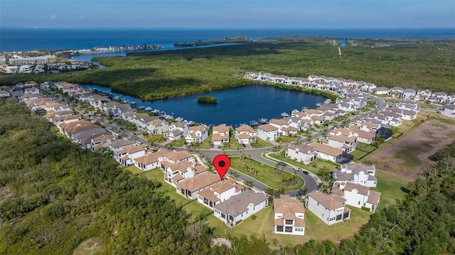 aerial view featuring a water view and a residential view