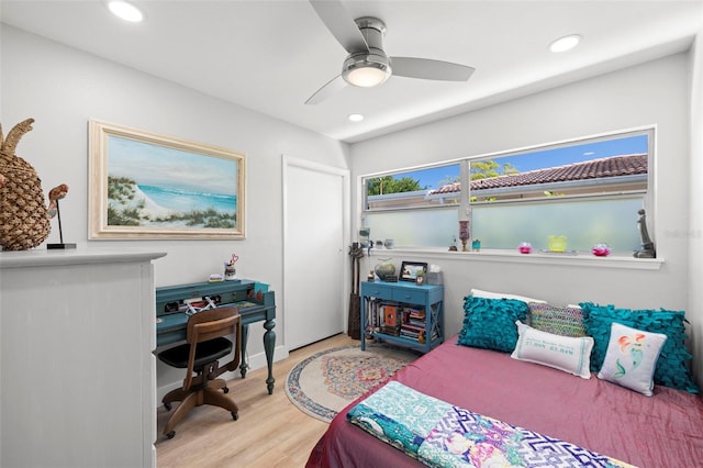 bedroom featuring a ceiling fan, recessed lighting, and wood finished floors