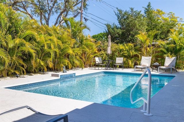 pool with a patio