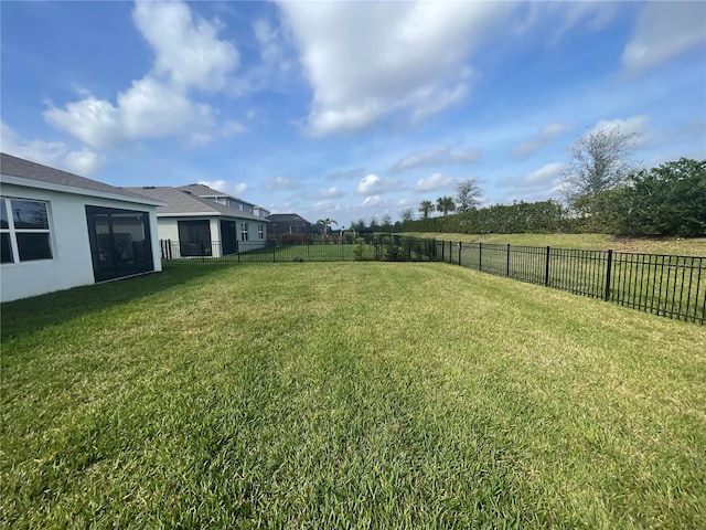 view of yard with a fenced backyard