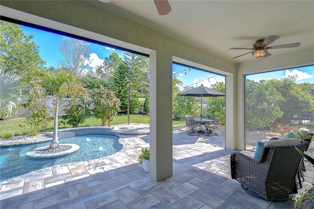 view of patio with outdoor dining space, an outdoor pool, and ceiling fan