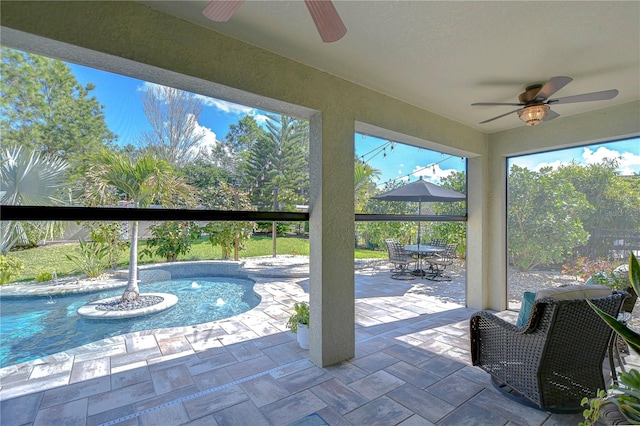 view of patio / terrace featuring outdoor dining area, an outdoor pool, a lanai, and ceiling fan