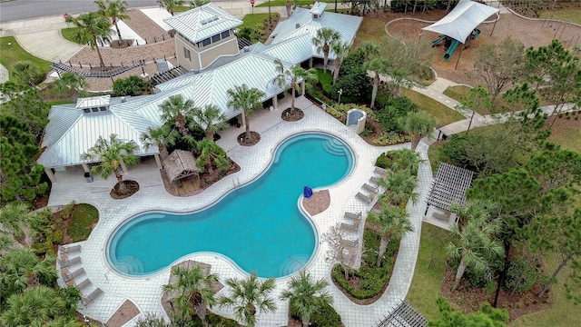 pool with a patio area