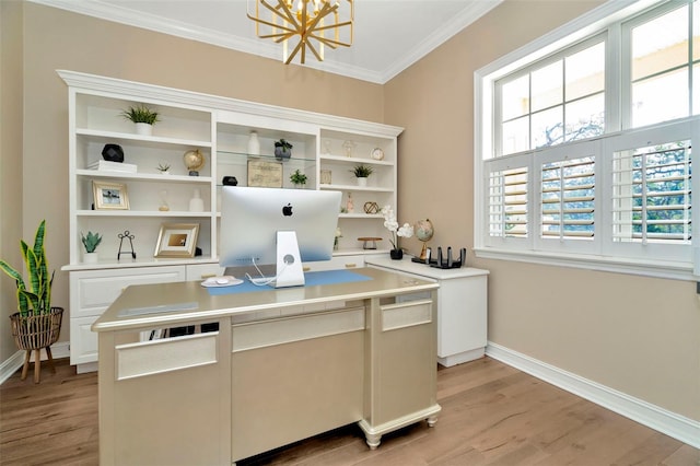 office with light wood finished floors, baseboards, ornamental molding, and a notable chandelier