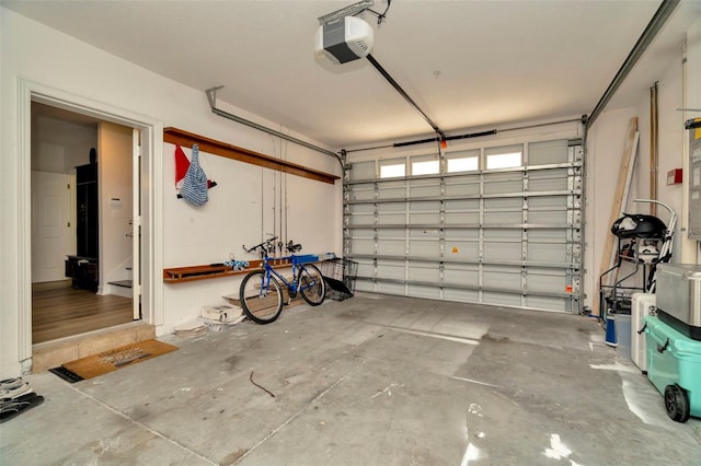 garage featuring a garage door opener