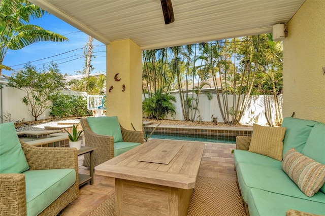 view of patio / terrace featuring outdoor lounge area and a fenced backyard