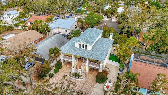 birds eye view of property with a residential view