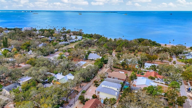 bird's eye view with a water view and a residential view