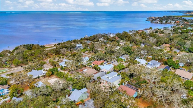 drone / aerial view featuring a residential view and a water view