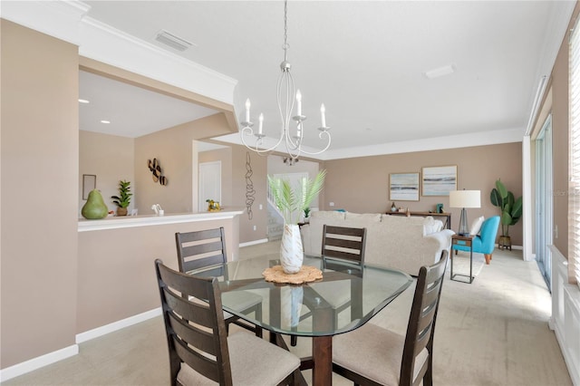 dining area with an inviting chandelier, baseboards, visible vents, and ornamental molding