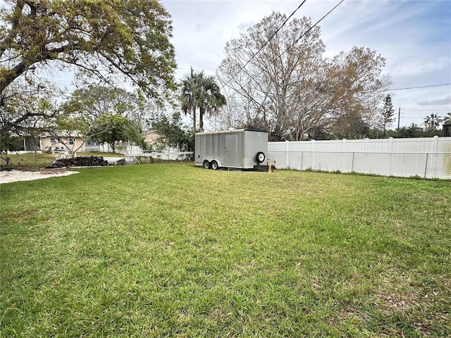 view of yard with fence