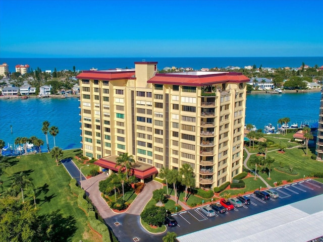 birds eye view of property featuring a water view