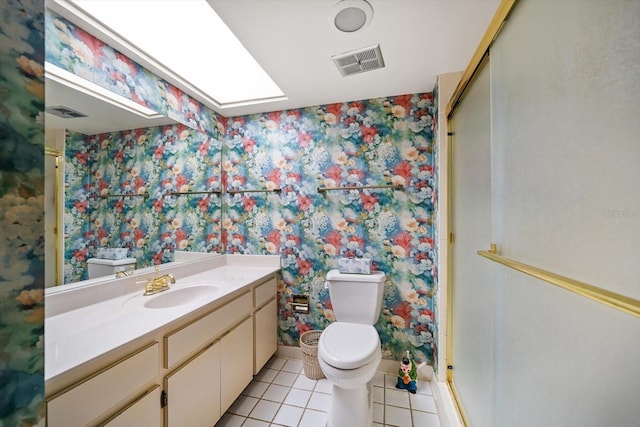 full bath featuring wallpapered walls, a stall shower, visible vents, toilet, and tile patterned flooring