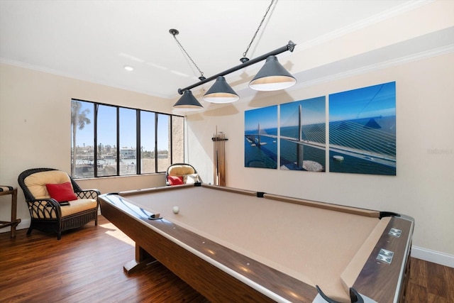 recreation room featuring billiards, baseboards, wood finished floors, and crown molding