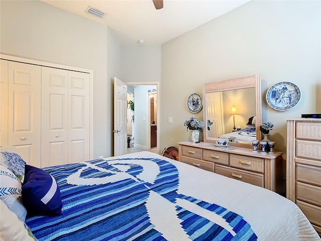 bedroom with ceiling fan, a closet, and visible vents