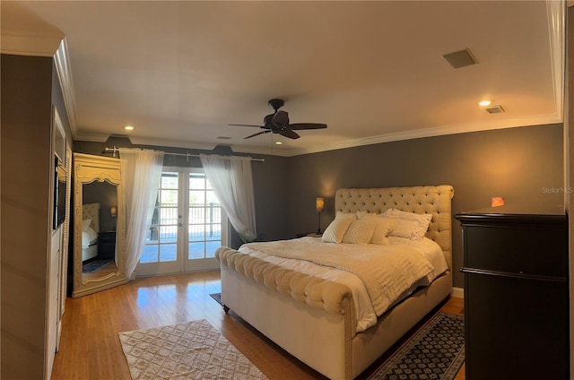 bedroom with access to exterior, recessed lighting, crown molding, and light wood-style floors