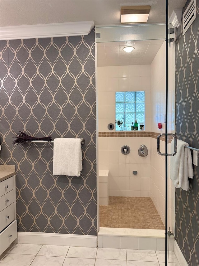 full bath featuring a shower stall and vanity