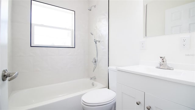 full bathroom featuring shower / washtub combination, vanity, and toilet