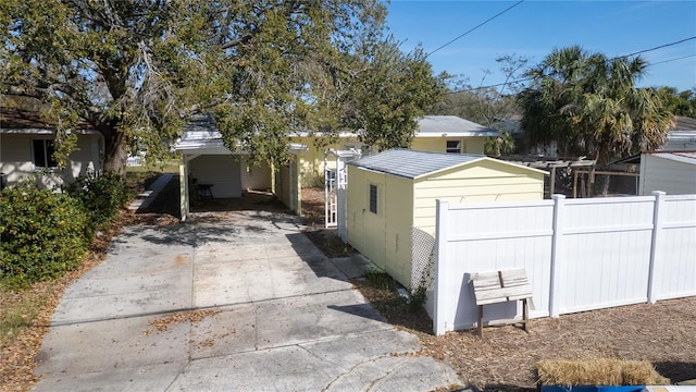 view of side of property with fence