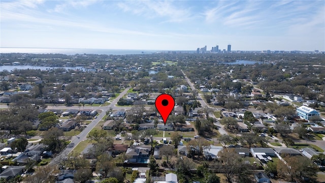 birds eye view of property featuring a city view