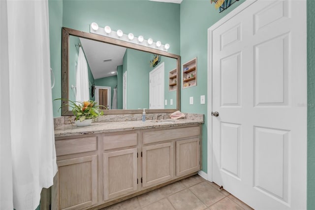 bathroom featuring vanity and tile patterned floors